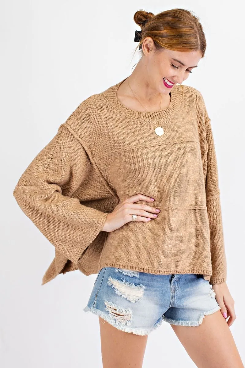 Oversized wide sleeve sweater with rounded neckline