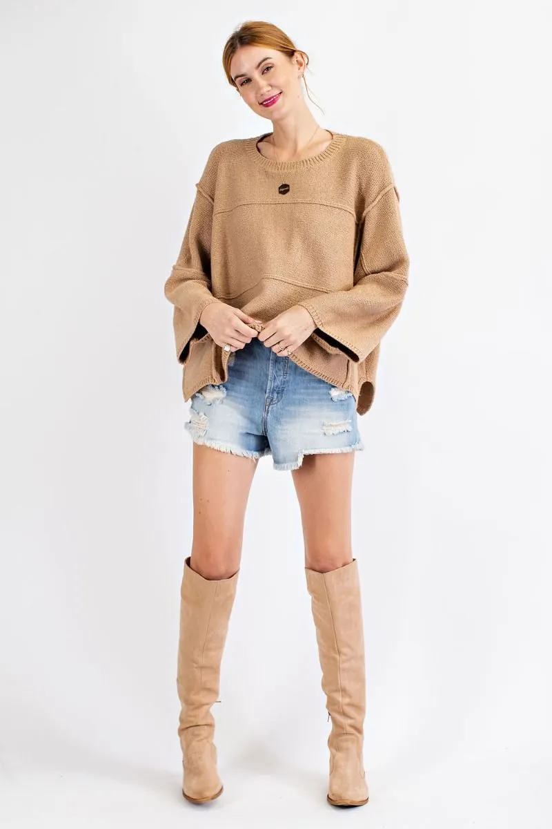 Oversized wide sleeve sweater with rounded neckline